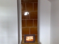 Reparatur und Einbau Feuerraumtuere alter Ofen